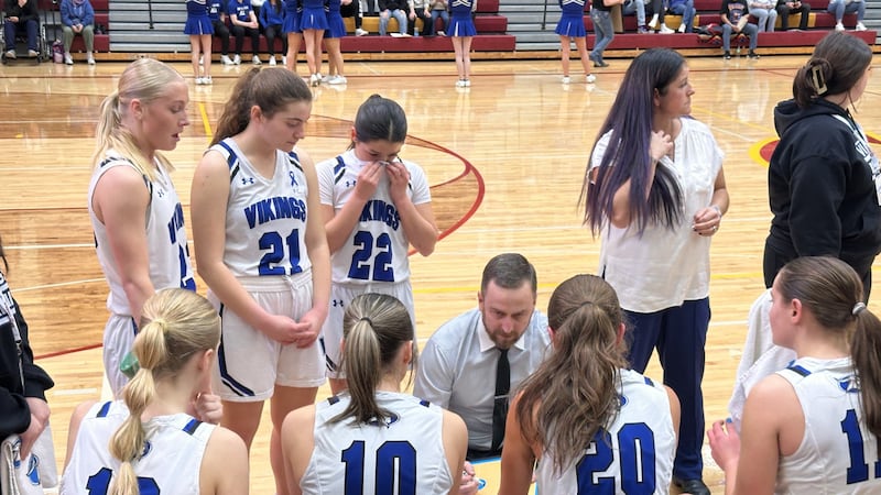 Valley head coach Derek Malone talks with the team during a timeout against Lakeside on Feb....
