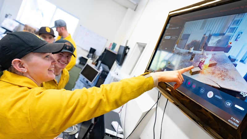 University of Idaho engineering students are designing a device used to produce embers for...